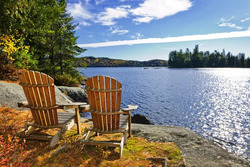 an image of two chair on the beach